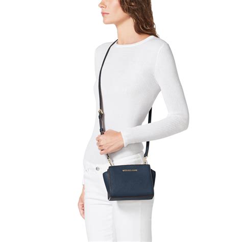 michael kors selma silver saffiano leather mini messenger navy blue|Selma Medium Saffiano Leather Crossbody Bag .